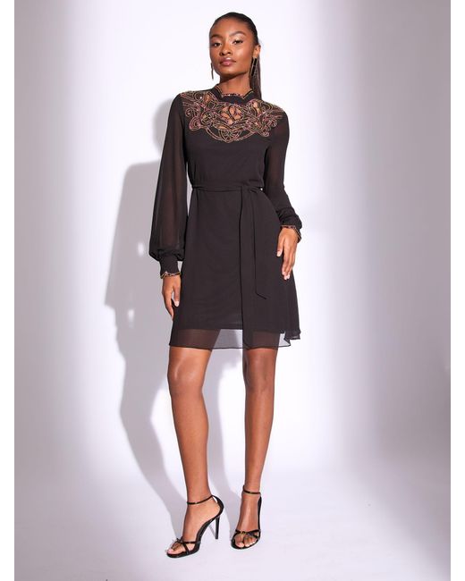Lipsy Petite Sequin Embellished Cut Out Artwork Long Sleeve Mini Shift Dress  in Black | Lyst
