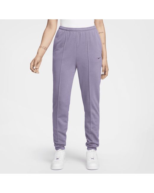 Pantaloni tuta slim fit in french terry a vita alta sportswear chill terry di Nike in Purple