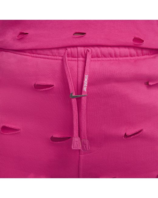 Pantaloni con swoosh x jacquemus di Nike in Pink
