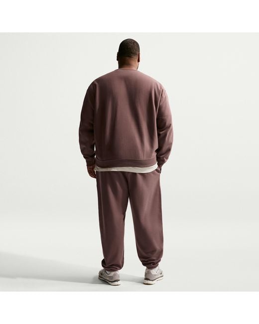 Nike Red Solo Swoosh Cuffed Fleece Pants for men