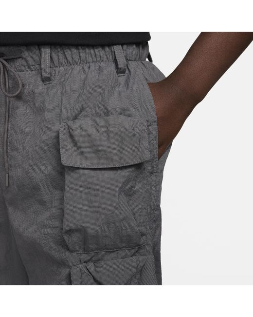 Pantaloni con fodera in tessuto sportswear tech pack di Nike in Gray da Uomo
