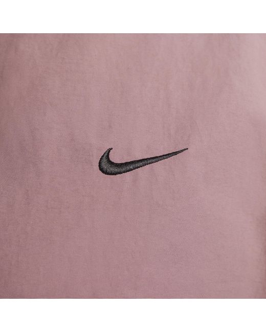 Nike Sportswear Everything Wovens Oversized Jack Met Capuchon in het Pink