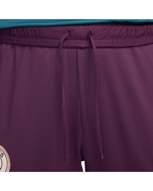 Pantaloni da calcio in maglia dri-fit paris saint-germain strike di Nike in Purple
