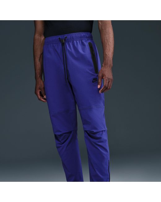 Nike Tech Geweven Herenbroek in het Blue voor heren