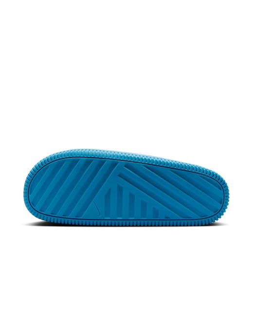 Nike Calm Printed Slides In Blue For Men Lyst Nike calm printed slides in blue for men lyst