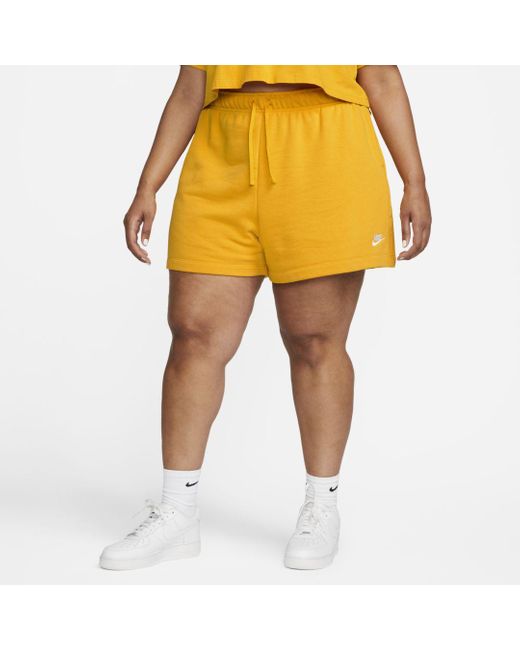 yellow nike fleece shorts