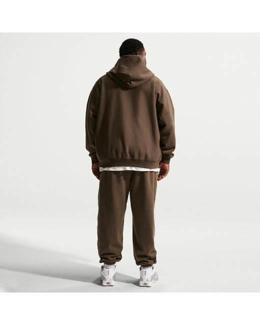 Nike Black Solo Swoosh Cuffed Fleece Pants for men