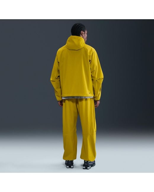 nike tech suit yellow