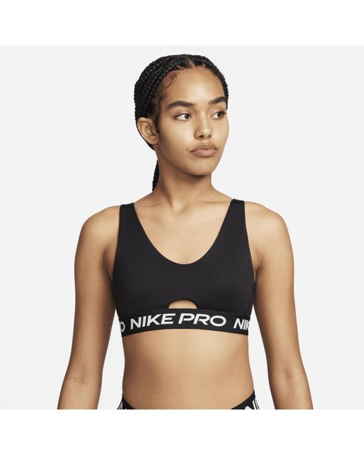 Bra imbottito a sostegno medio pro indy plunge di Nike in Black