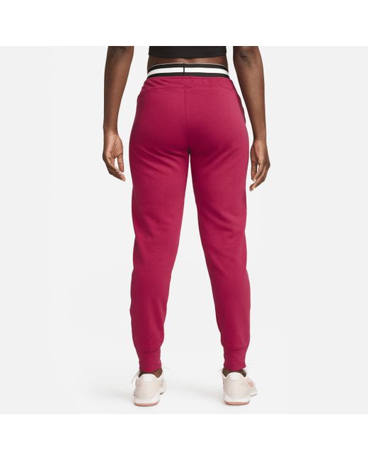 nike Red Court Dri fit Heritage French Terry Tennis Trousers