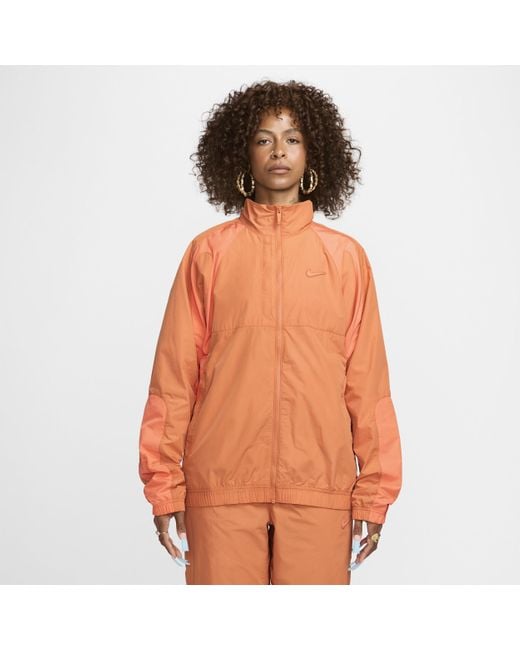 Orange nike tracksuit deals