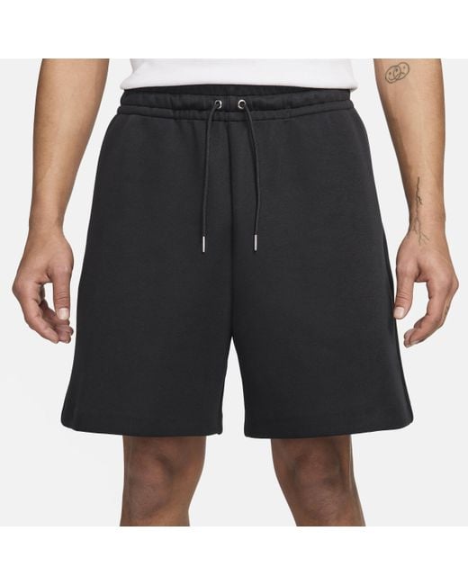 Shorts in fleece sportswear tech fleece reimagined di Nike in Black da Uomo