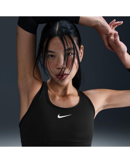 Brassière De Sport Longue Rembourrée À Maintien Normal Swoosh Pocket Pour Femme Nike en coloris Black