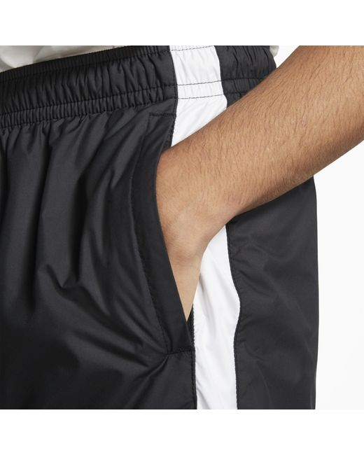 nike black tracksuit bottoms mens