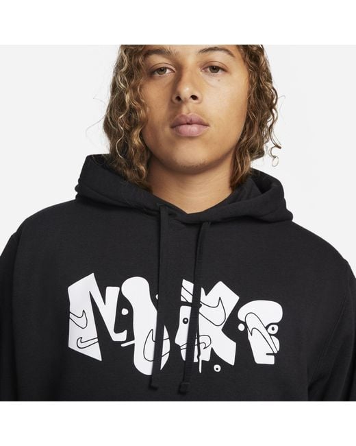 Nike Club Fleece+ Graphic Pullover Hoodie in Black,Light Crimson (Black