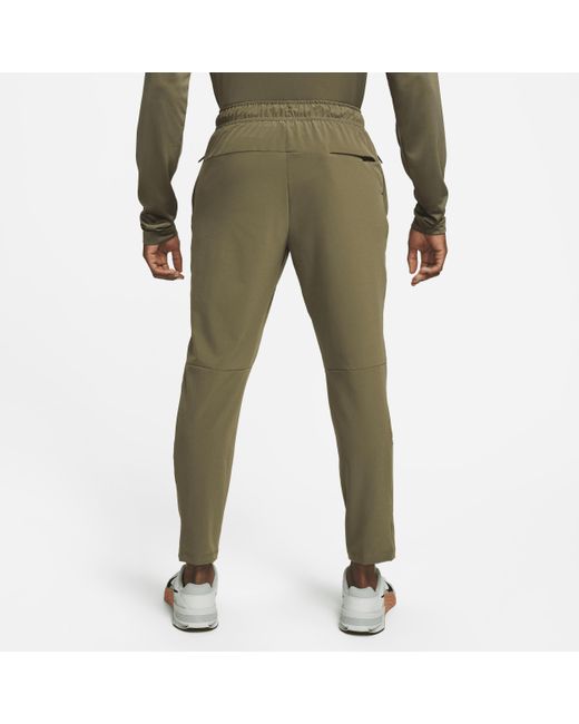 Nike Green Unlimited Dri-fit Tapered Leg Versatile Pants for men