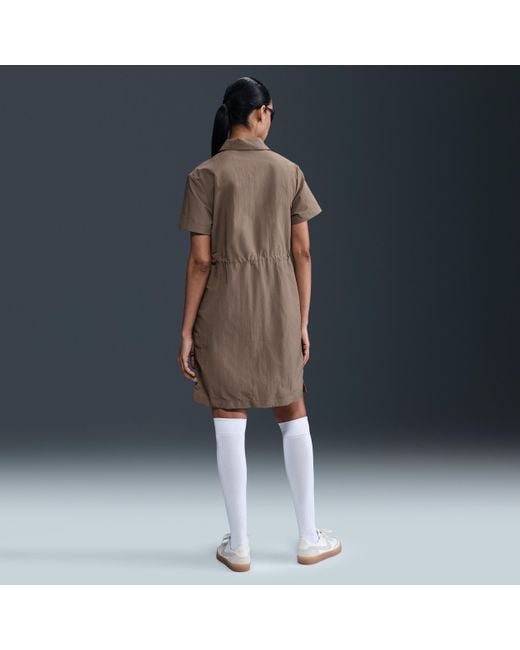 ★ Nike★ Sportswear Everything Woven Short Sleeve Mini Dre Nike Everything woven dress in black | ASOS