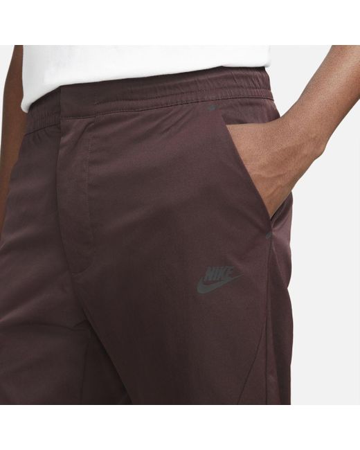 Nike Sportswear Tech Essentials Unlined Commuter Pants in Brown for Men - Lyst