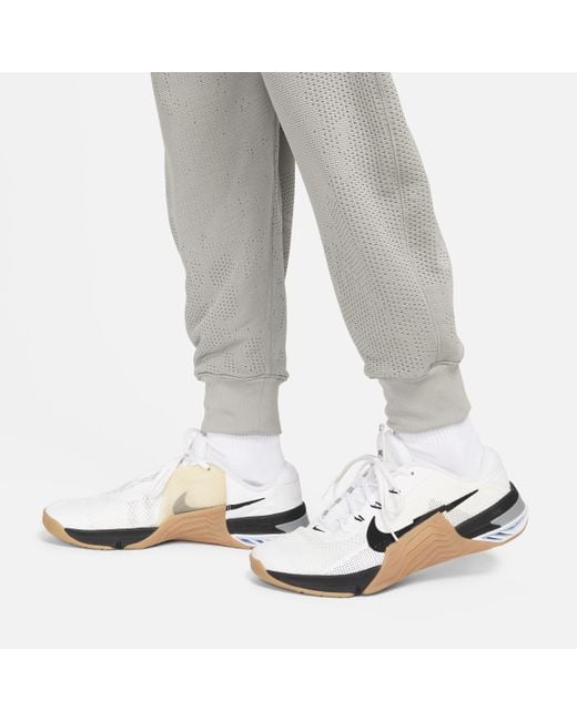 Nike Gray A.p.s. Therma-fit Versatile Pants for men