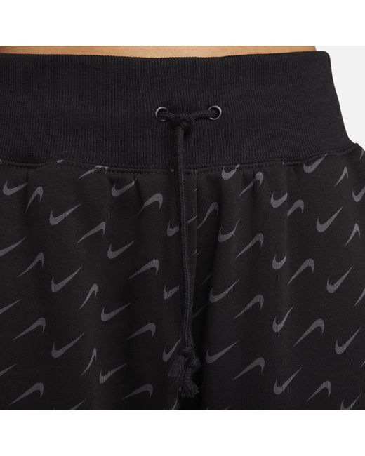 Sportswear Phoenix Tracksuit di Nike in Black