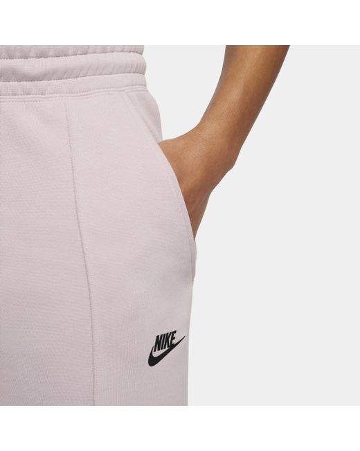 Pantaloni jogger a vita media sportswear tech fleece di Nike in Pink