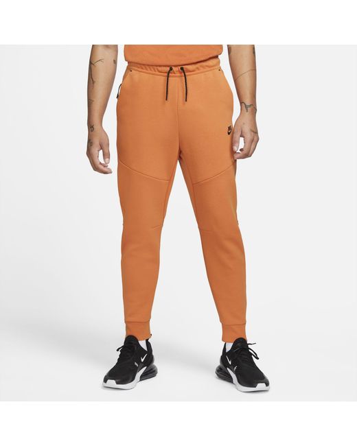Nike Orange Sportswear Tech Fleece Joggers for men