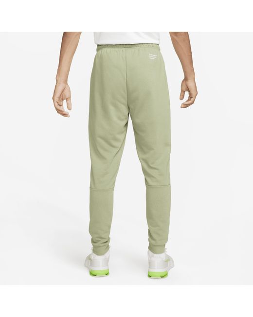 Pantaloni da fitness affusolati dri-fit di Nike in Green da Uomo