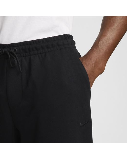 Nike Black Primary Fleece Dri-Fit Uv Performance Jogger Pants for men