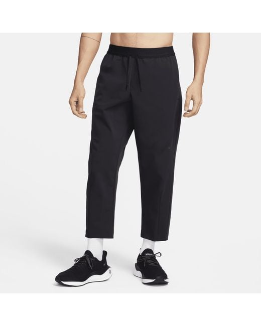 A.p.s. pantaloni versatili in tessuto dri-fit di Nike in Black da Uomo