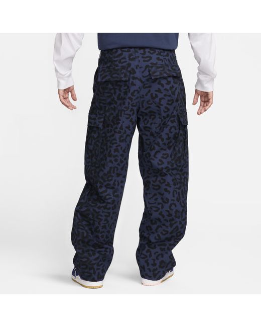 Pantaloni cargo con stampa all-over sb kearny di Nike in Blue da Uomo