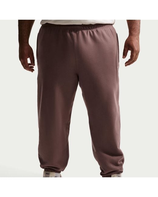 Nike Red Solo Swoosh Cuffed Fleece Pants for men