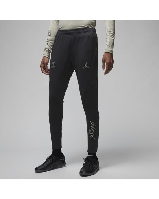 Pantaloni da calcio in maglia jordan dri-fit paris saint-germain strike da uomo di Nike in Black da Uomo