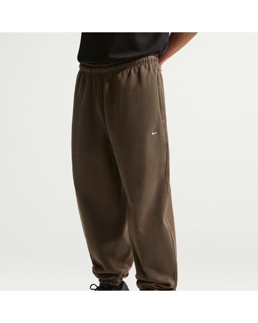 Nike Black Solo Swoosh Cuffed Fleece Pants for men