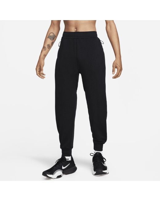 Pantaloni versatili a.p.s. therma-fit di Nike in Black da Uomo