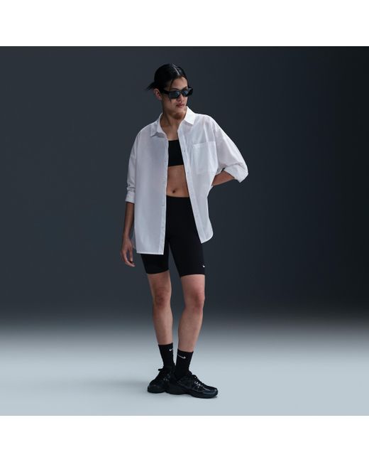 Nike Sportswear Chill Poplin Ruimvallende Damestop Met Lange Mouwen En Knoopsluiting in het Blue