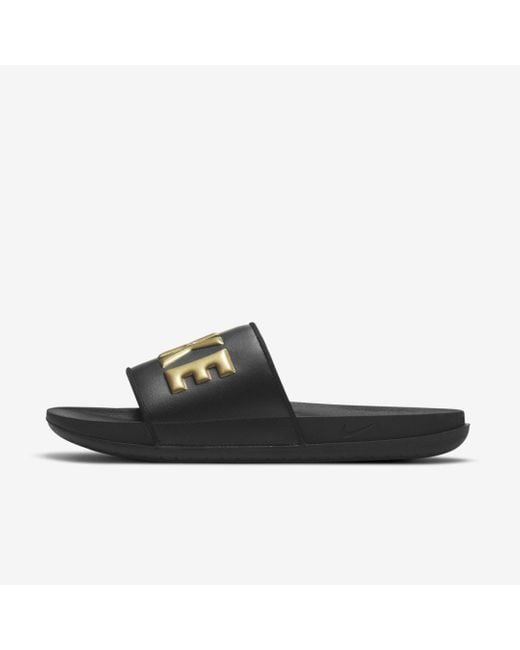 mens black and gold nike slides