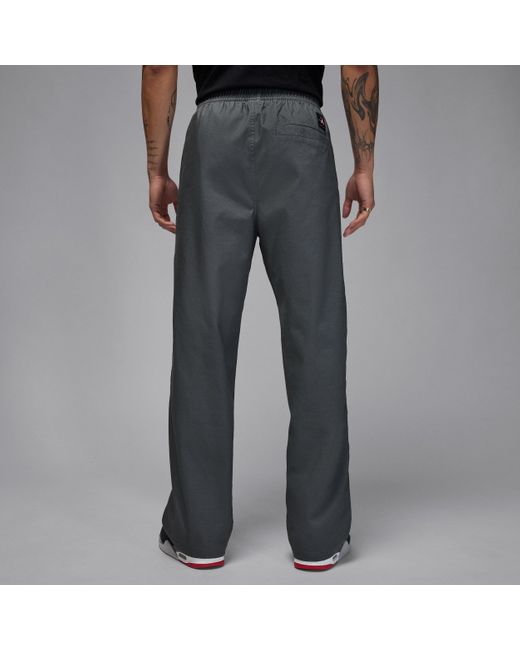 nike essential woven pants grey