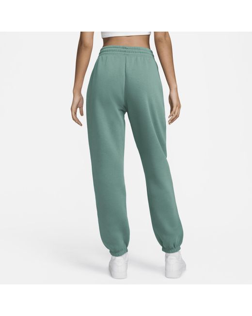 Pantaloni tuta oversize a vita alta sportswear phoenix fleece di Nike in Green