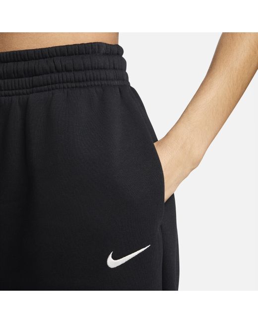 Pantaloni tuta oversize a vita alta sportswear phoenix fleece di Nike in Black