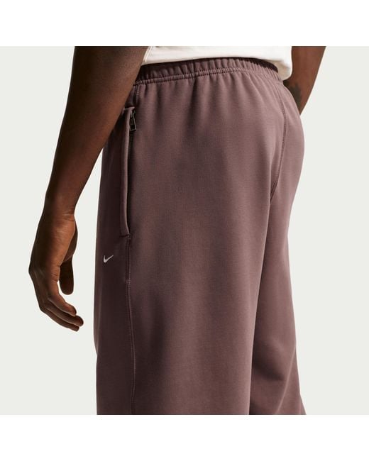 Nike Red Solo Swoosh Cuffed Fleece Pants for men