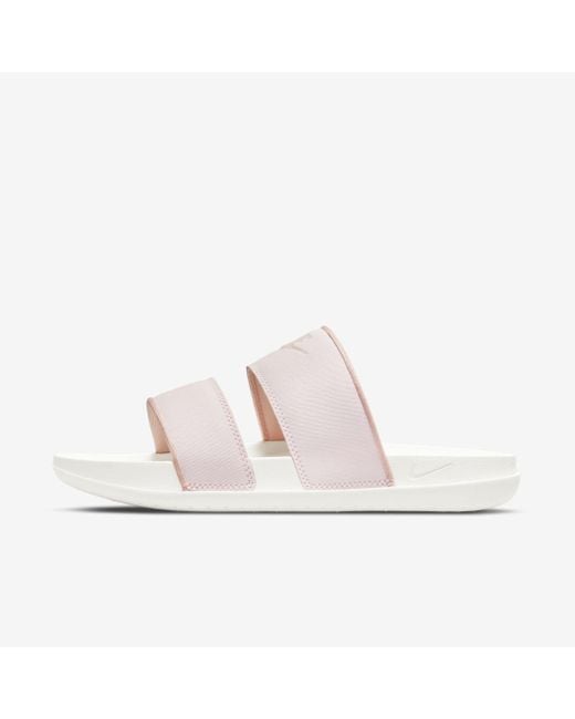 wine colored nike slides