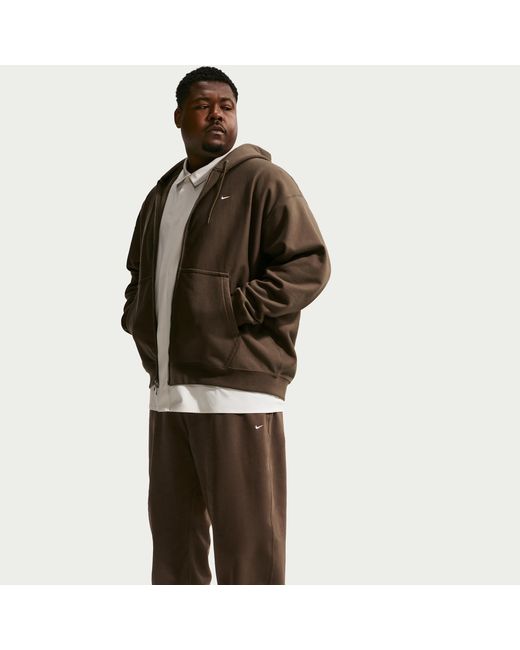 Nike Black Solo Swoosh Cuffed Fleece Pants for men