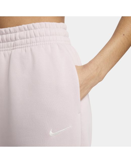 Pantaloni tuta oversize a vita alta sportswear phoenix fleece di Nike in Purple