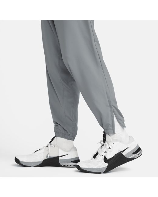 Nike Gray Form Dri-fit Tapered Versatile Pants for men