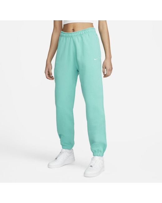 Nike Solo Swoosh Fleece Pants in Washed Teal,White (Green) | Lyst