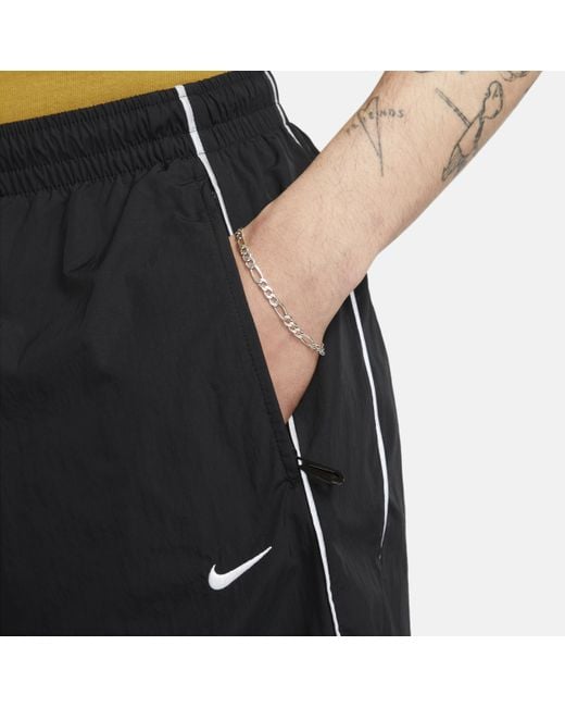 Nike Black Solo Swoosh Track Pants for men