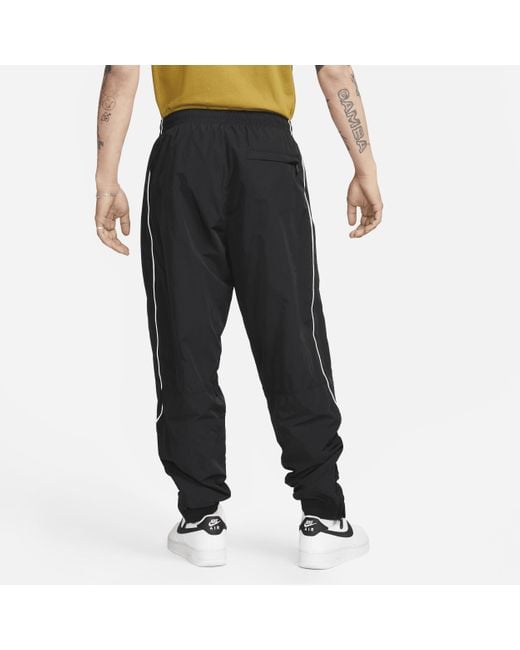 Nike Black Solo Swoosh Track Pants for men