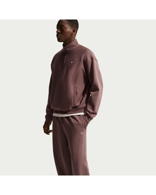 Nike Red Solo Swoosh Cuffed Fleece Pants for men