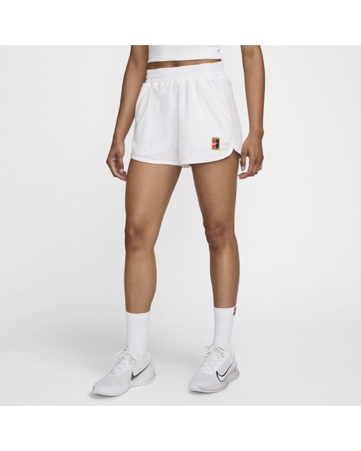 Nike tennis shorts white top