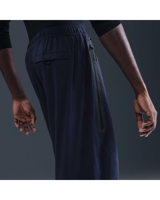 Nike Blue Tech Woven Oversized Trousers for men